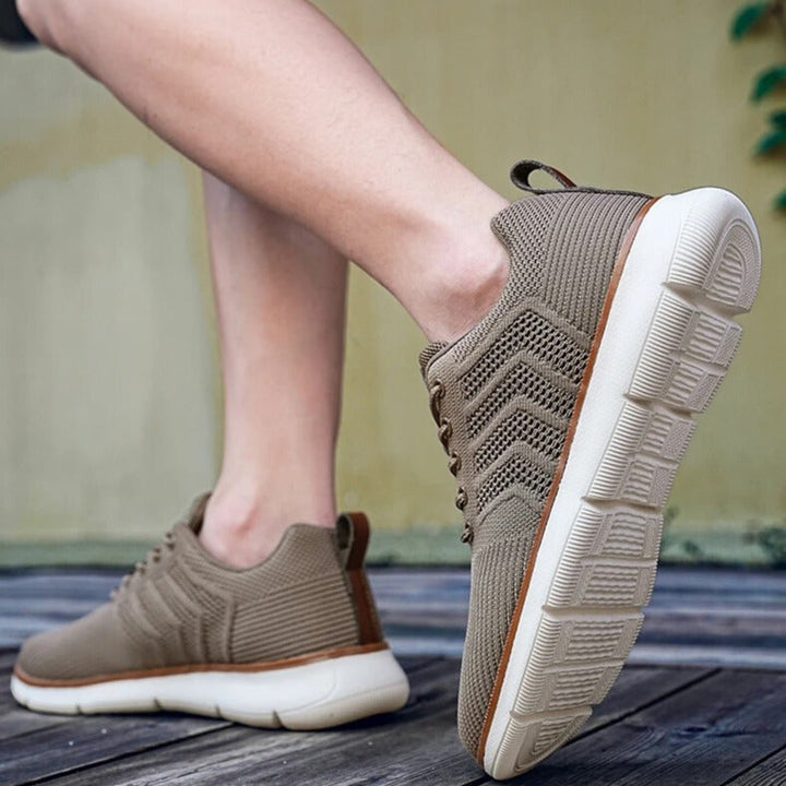 Dynamiczne męskie sneakersy sznurowane, lekkie, z teksturą. Idealne do aktywności i codziennego użytku.