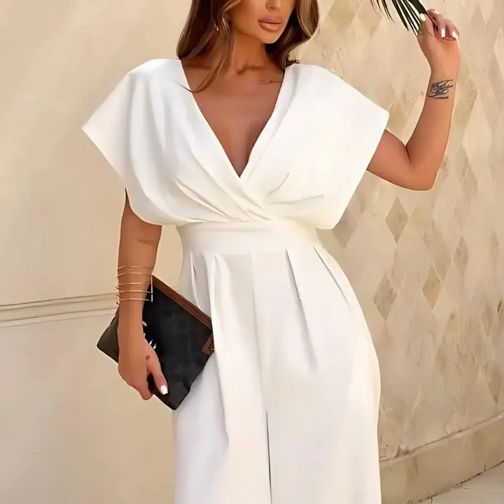 Stylowy damski kombinezon z szerokimi nogawkami, elegancki design, idealny na przyjęcia.