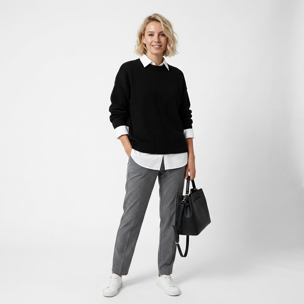 Elegancki sweter damski z kaszmiru, zapewniający miękki komfort. Klasyczny, modny fason odzieży damskiej.