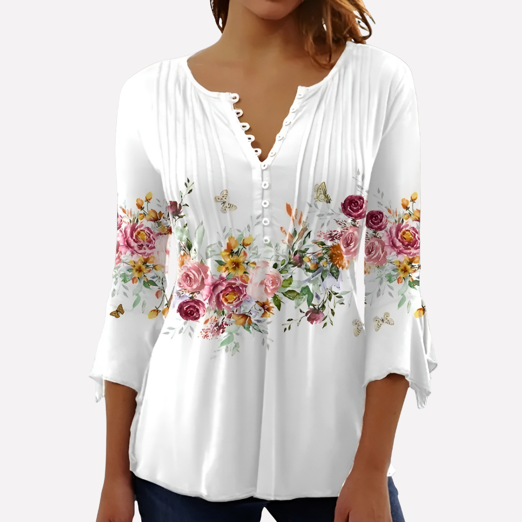 Elegancki top damski w geometryczny wzór, z wyszczuplającymi zaszewkami. Idealny na lato. Modna bluzka.