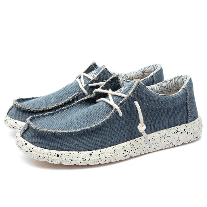 Nowoczesne męskie buty płócienne sznurowane, idealne do casualowych stylizacji. Lekkie, wygodne i oddychające trampki.