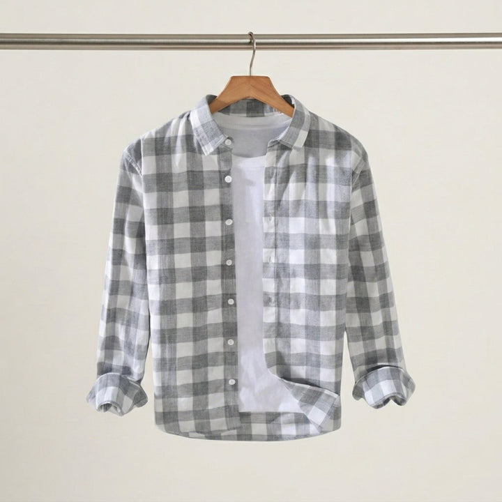 Elegancka koszula męska w kratkę, z kołnierzykiem button down. Perfekcyjna do pracy, stylu smart casual.
