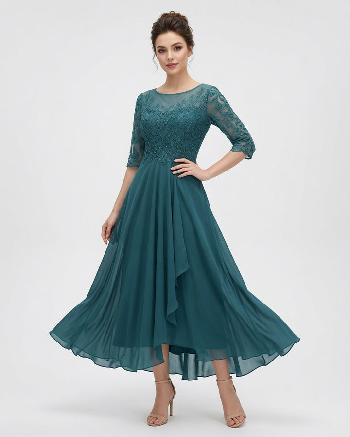 Damska haftowana sukienka midi z warstwową spódnicą, idealna na eleganckie przyjęcie. Smart casual.