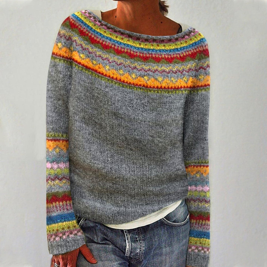 Damski sweter z okrągłym dekoltem, luźny krój, idealny na co dzień. Komfortowy i modny.