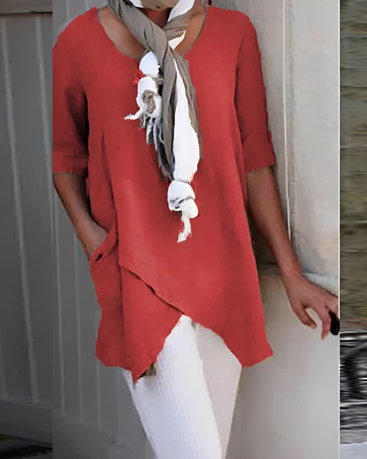 Bluzka damska z okrągłym dekoltem, elegancki fason. Modny top do casualowych, codziennych stylizacji. Wiosenny must-have.