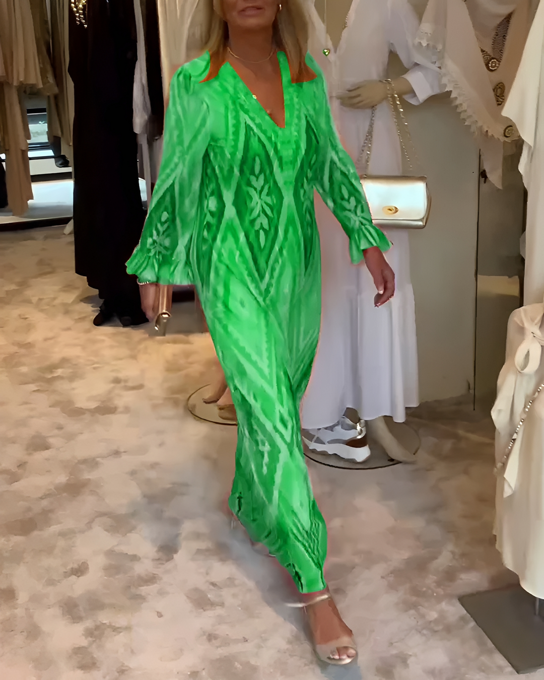Elegancka damska maxi sukienka z długim rękawem, idealna na lato i na co dzień. Modna i komfortowa.