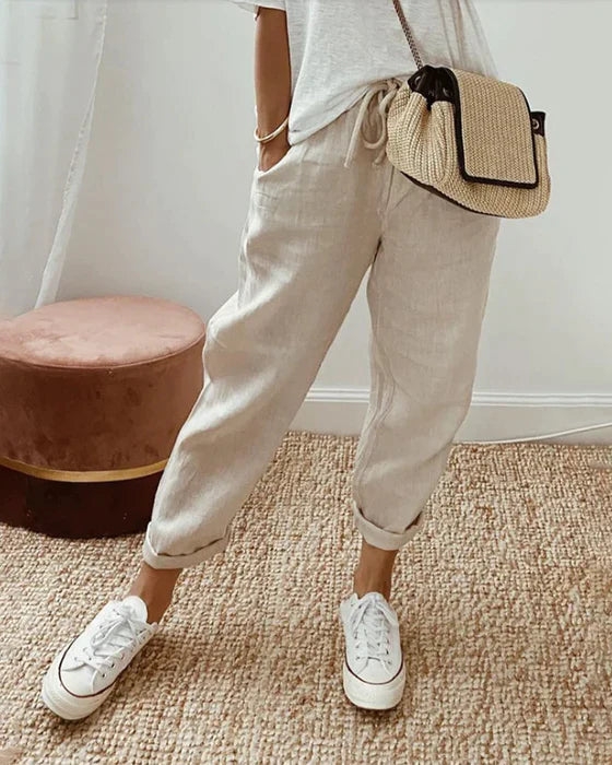 Szerokie damskie spodnie lniane boho na lato, przewiewne i wygodne. Idealne do casualowych stylizacji letnich.