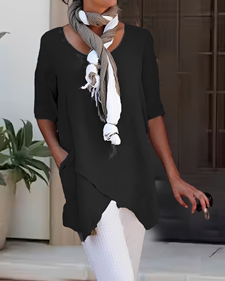Modna koszulka damska z okrągłym dekoltem. Casualowy top do codziennych i eleganckich stylizacji. Wiosenno-letnia.