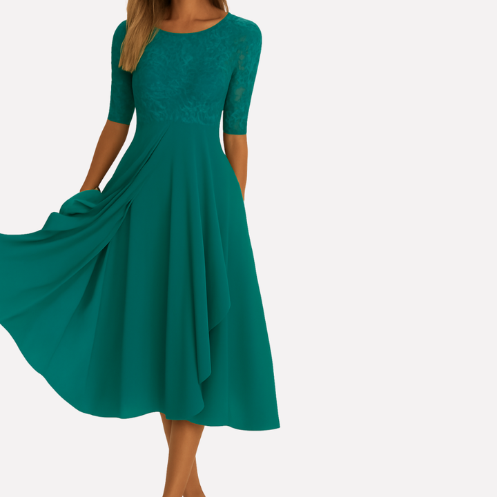 Modna damska sukienka maxi z koronkowymi detalami. Idealna na przyjęcia i eleganckie kolacje.