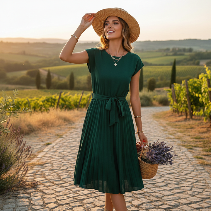 Modna plisowana sukienka midi Jelica, must-have w damskiej szafie na wiosenno-letnie stylizacje.