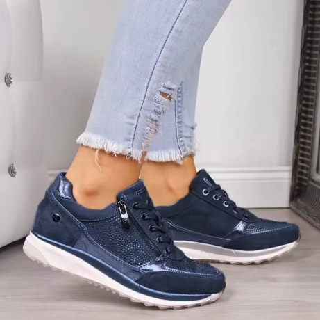 Ortopedyczne damskie sneakersy na platformie, zapewniające wsparcie stopy i maksymalny komfort chodzenia.