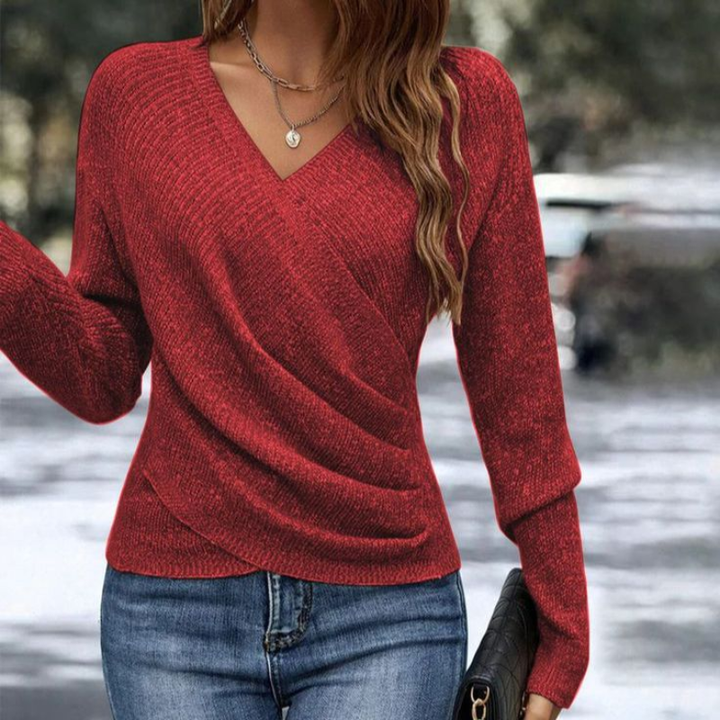 Stylowy sweter damski z dekoltem V, ozdobnym marszczeniem. Wygodna dzianina idealna do eleganckich i casualowych stylizacji.
