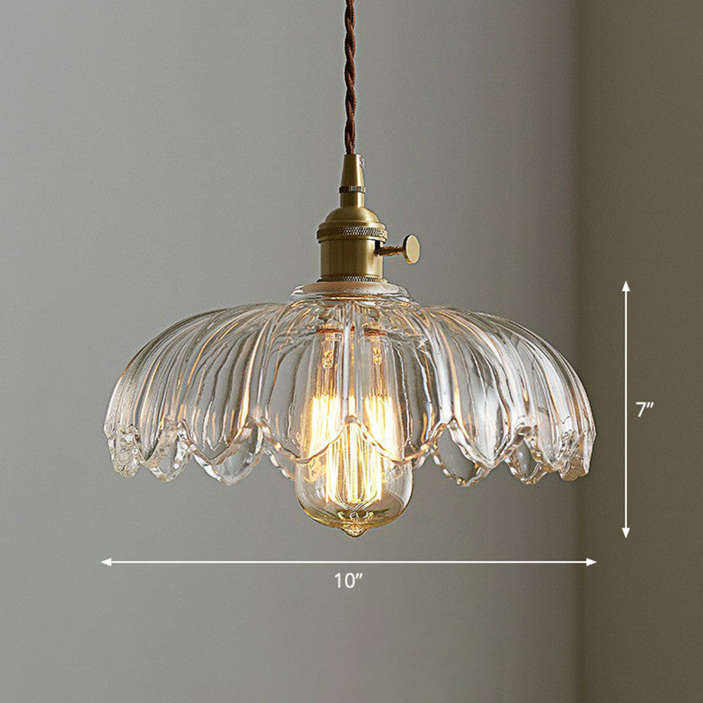 Elegancka lampa wisząca szklana do przedpokoju, bursztynowa, witająca gości ciepłym światłem.
