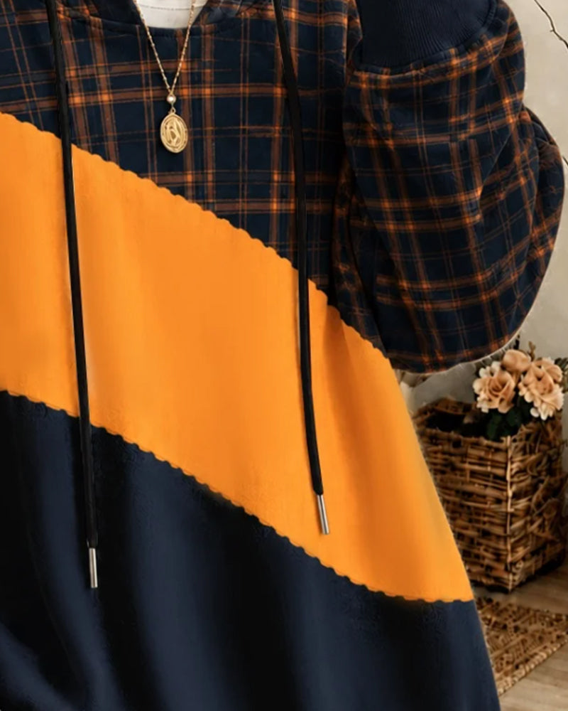 Wygodna bluza unisex z kapturem i długim rękawem. Kontrastowe panele dodają modnego, miejskiego stylu.