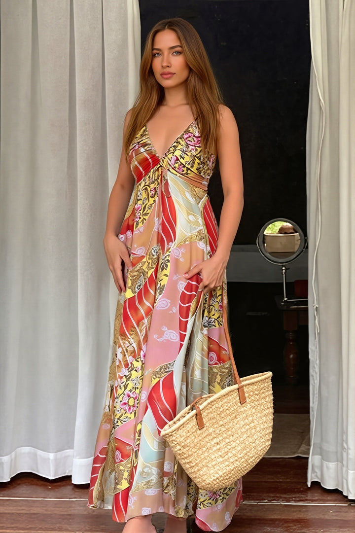 Czerwona damska sukienka midi w kwiaty boho na lato, z dekoltem V i na ramiączkach.