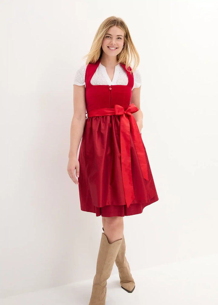 Dopasowana sukienka dirndl midi z dekoltem. Elegancki strój bawarski na Oktoberfest i wizytowe okazje.