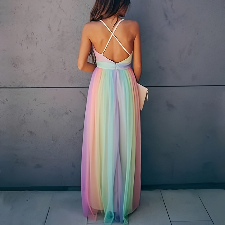 Elegancka damska sukienka swing midi w kolorze niebieskim lub różowym. Idealna na letnie wyjścia, lekka i wygodna.