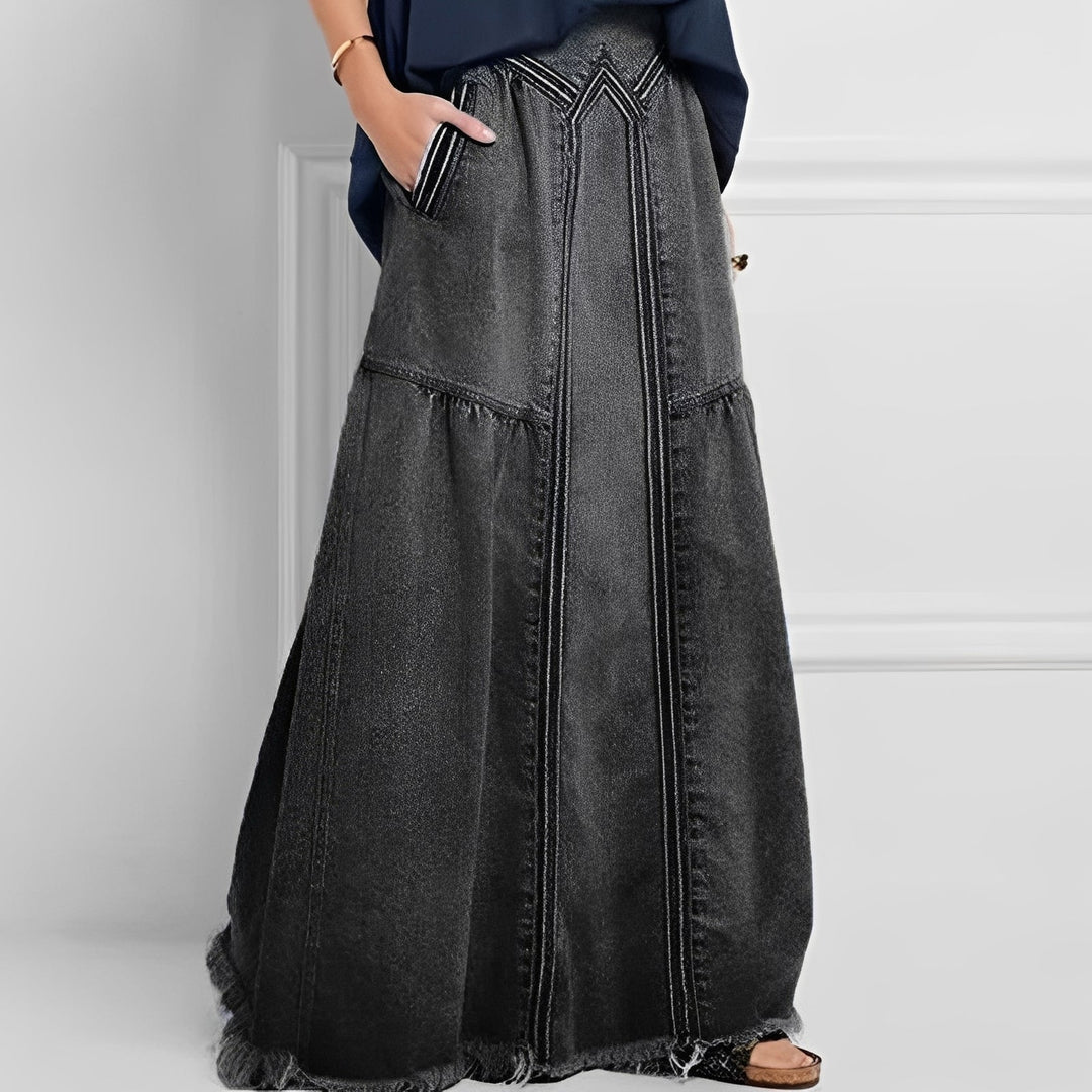 Praktyczna i stylowa damska spódnica jeansowa midi z dużą kieszenią. Must-have w casualowej modzie.