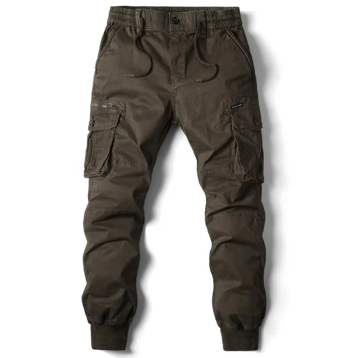 Męskie joggery cargo utility, podkreślające miejski styl. Wygodne spodnie z elastycznym pasem, idealne do streetwearu.