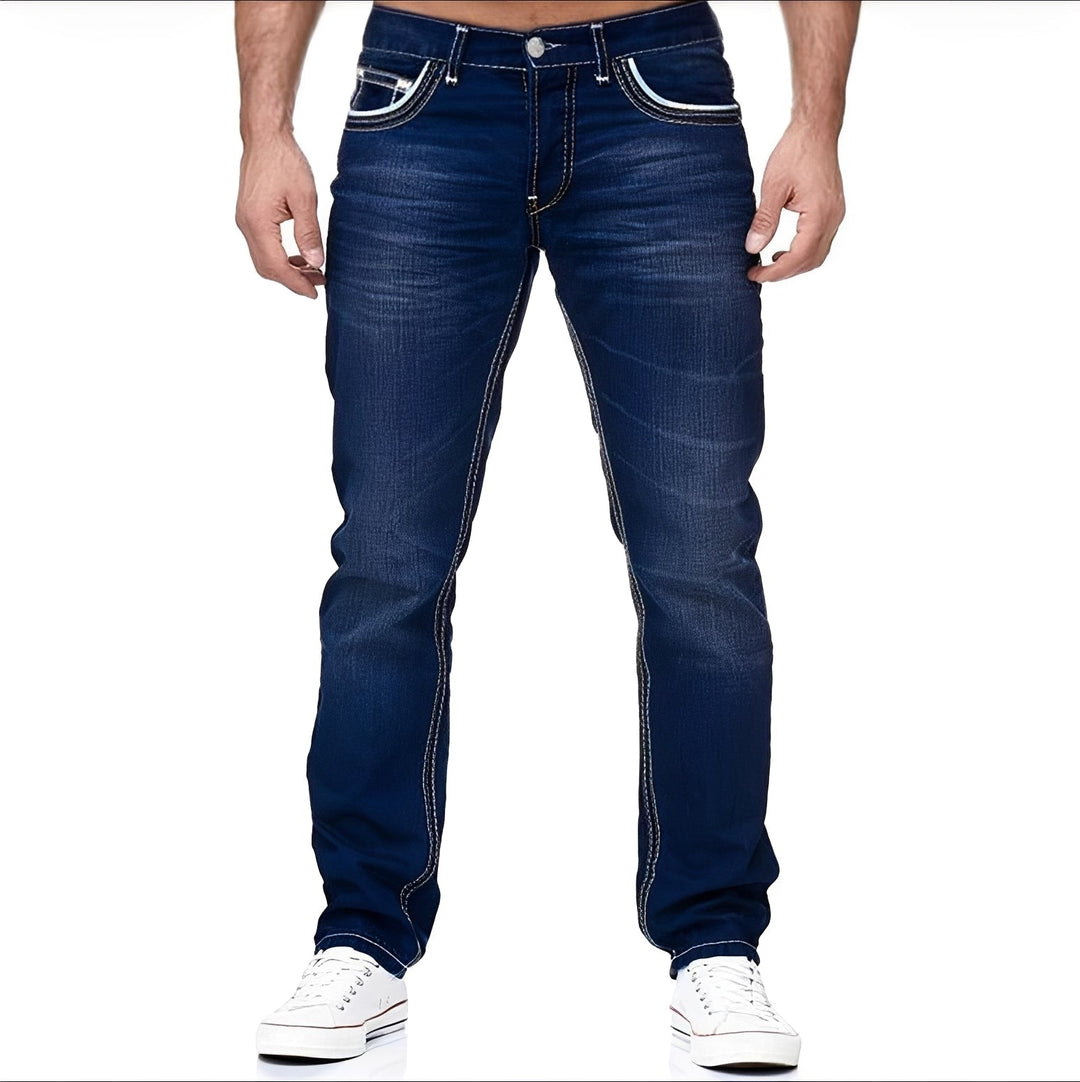 Męskie spodnie Andy denim z modnym efektem postarzenia. Idealne niebieskie jeansy dla komfortu i stylu casual.
