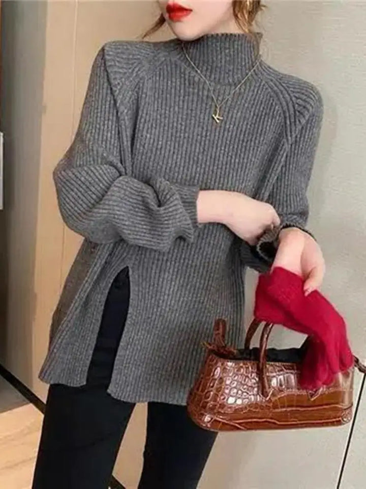 Damski golf sweter, dopasowany krój, z ozdobnym rozcięciem. Modna i ciepła odzież damska na jesień/zimę.