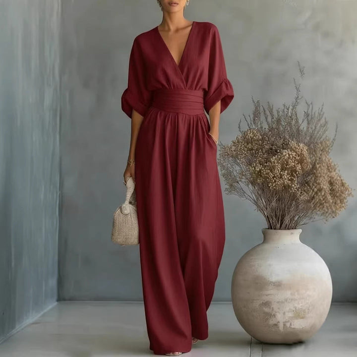 Elegancki damski kombinezon CJ26 z dekoltem V, idealny na wyjście, modny i stylowy krój.