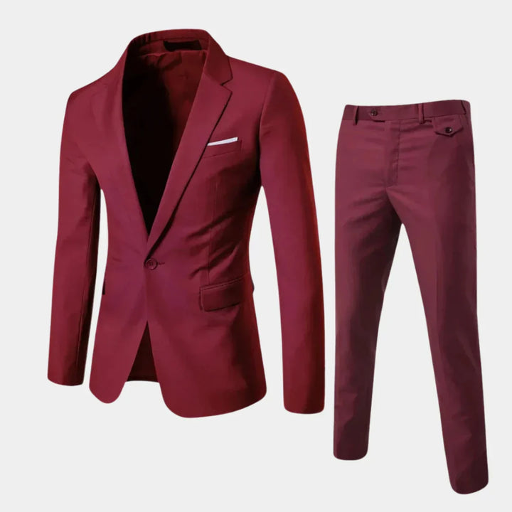 Kompletny męski garnitur slim fit: elegancka marynarka i spodnie, starannie ułożone, gotowe na każdą okazję.