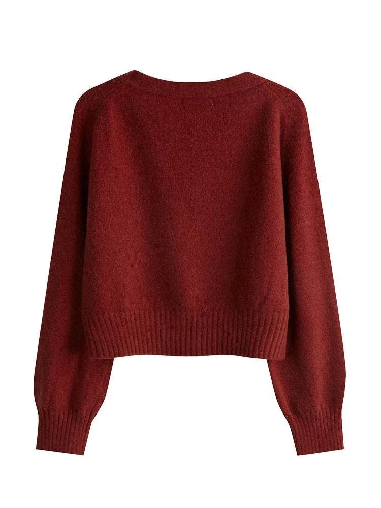 Elegancki, luźny kardigan damski z dekoltem w serek. Komfortowy sweter V-neck, uniwersalny na jesień i zimę.