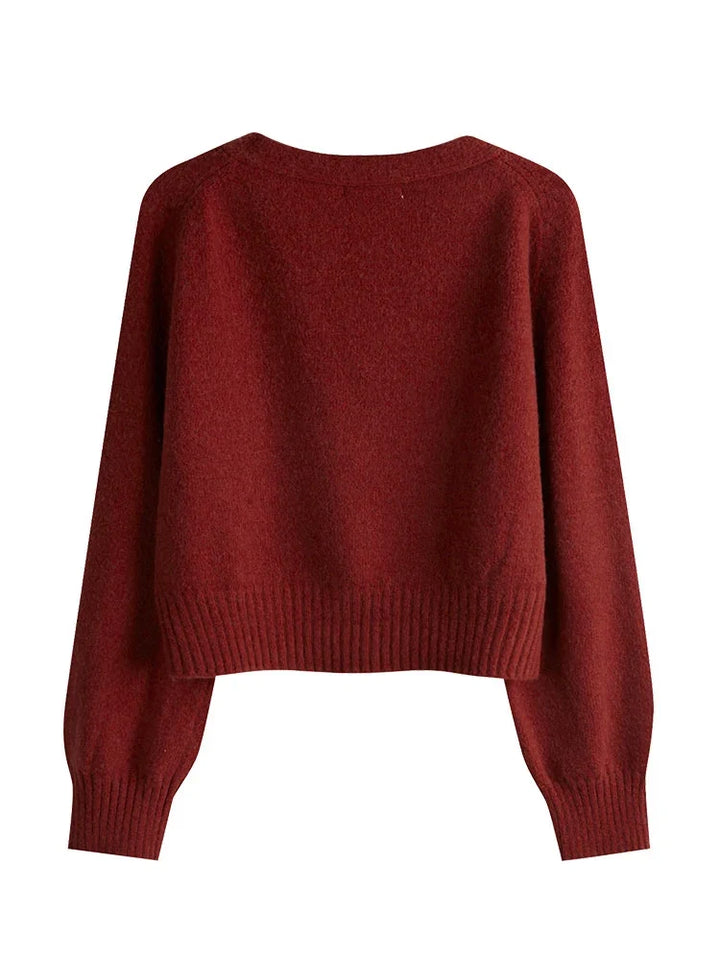 Elegancki, luźny kardigan damski z dekoltem w serek. Komfortowy sweter V-neck, uniwersalny na jesień i zimę.