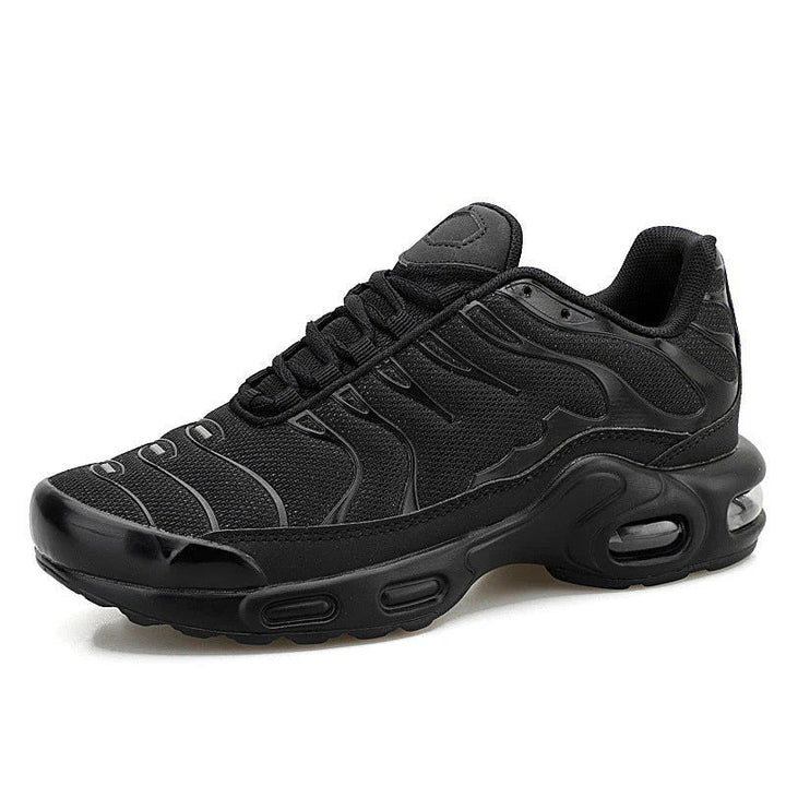 Męskie buty sportowe Titan z widoczną amortyzacją Air Cushion dla optymalnego odbicia, lekkie i wspierające podczas biegu.