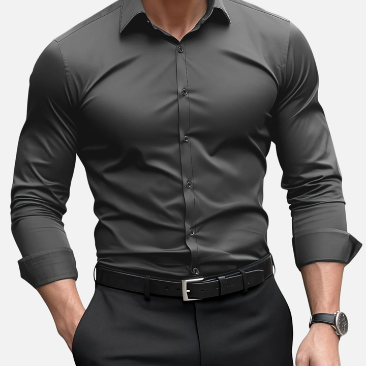 Męska koszula elegancka slim fit z długim rękawem. Dopasowany krój podkreśla sylwetkę, idealna na formalne wyjścia.