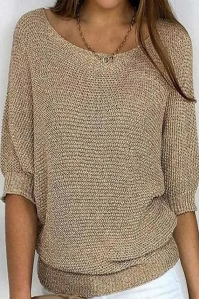 Dzianinowy sweter damski Mira. Luźny fason z szerokimi rękawami typu nietoperz, idealny na chłodne dni.