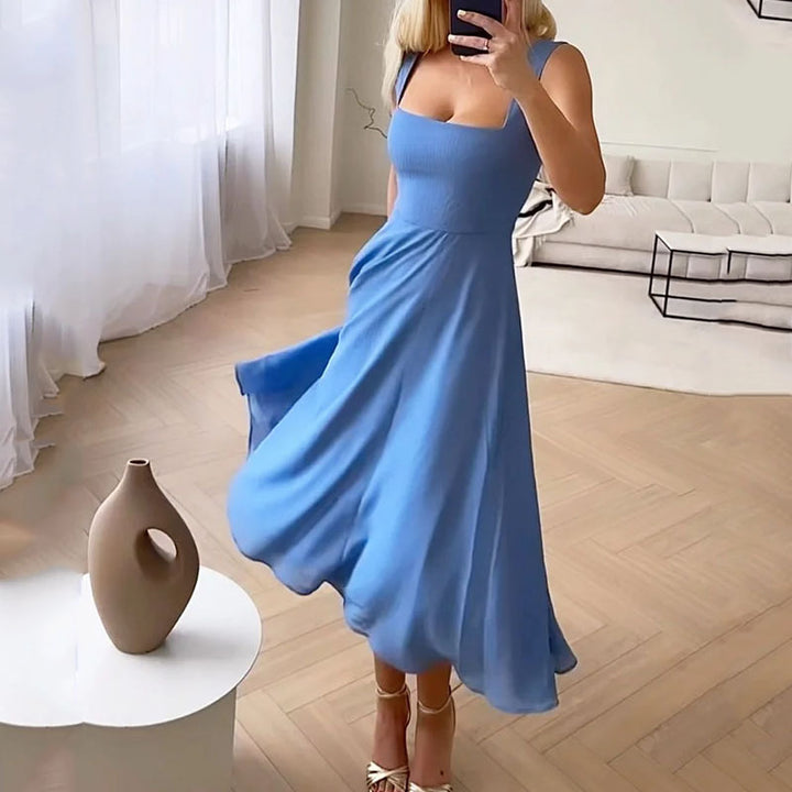 Damska sukienka midi z kwadratowym dekoltem, idealna na wesele. Elegancka, dostępna w kolorze niebieskim.