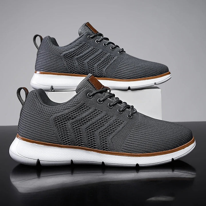 Stylowe męskie sneakersy casualowe, sznurowane, z teksturą i kontrastową podeszwą. Idealne na co dzień.