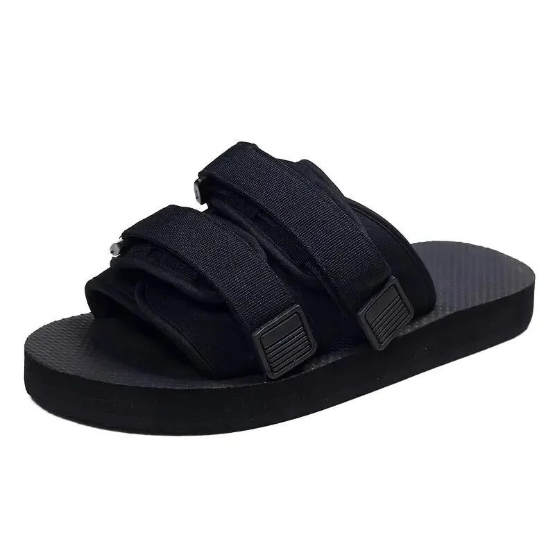 Czarne sandały płócienne unisex z rzepami. Wygodne i przewiewne buty letnie do codziennego użytku.
