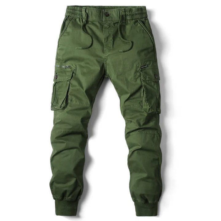 Joggery męskie cargo, widok z tyłu. Spodnie utility z elastycznym pasem i mankietami, casualowy styl.