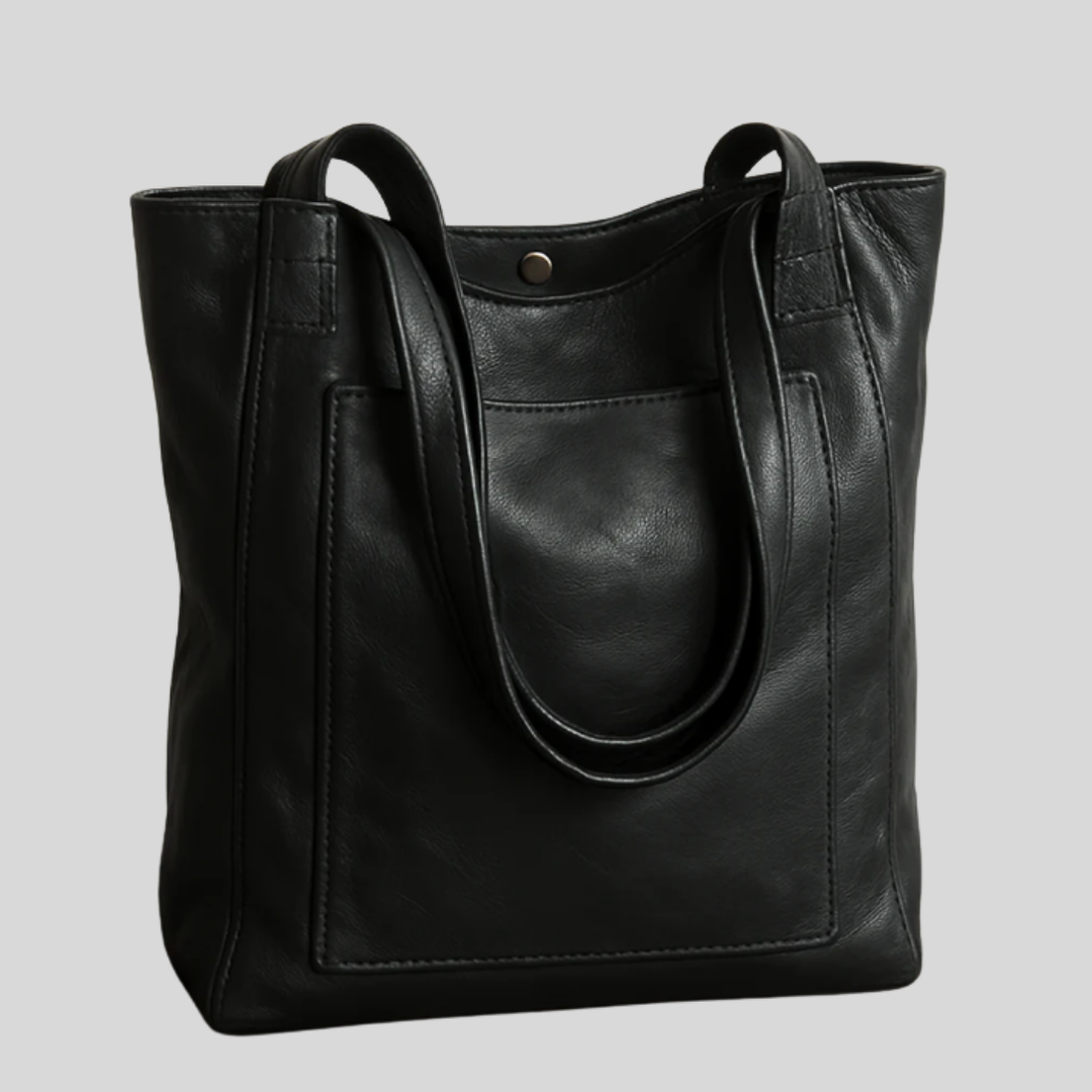 Damska torba na ramię z wysokiej jakości skóry, dostępna w brązie i czerni. Elegancka i funkcjonalna.