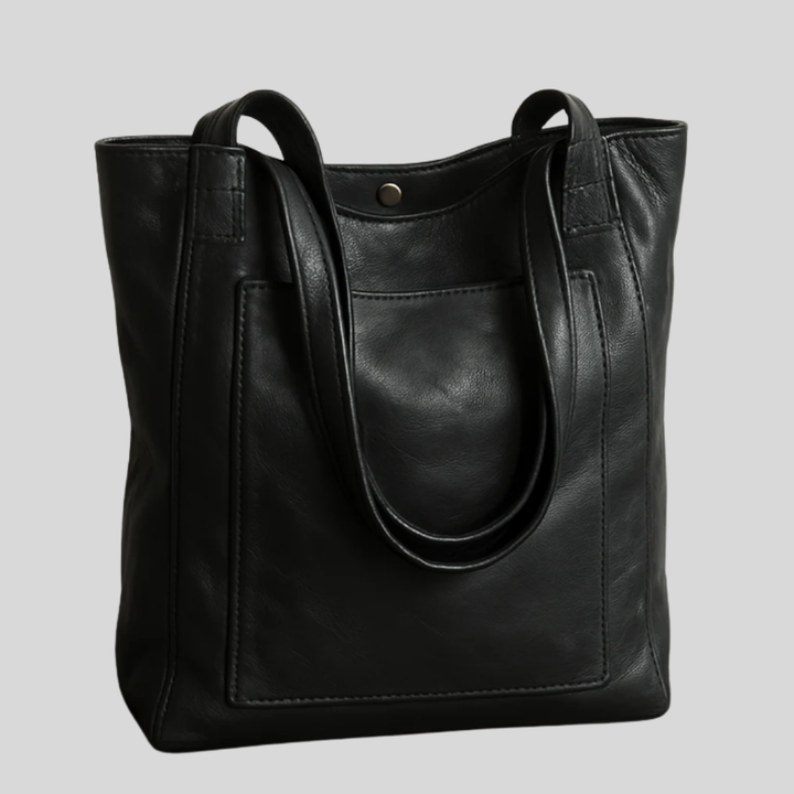 Damska torba na ramię z wysokiej jakości skóry, dostępna w brązie i czerni. Elegancka i funkcjonalna.