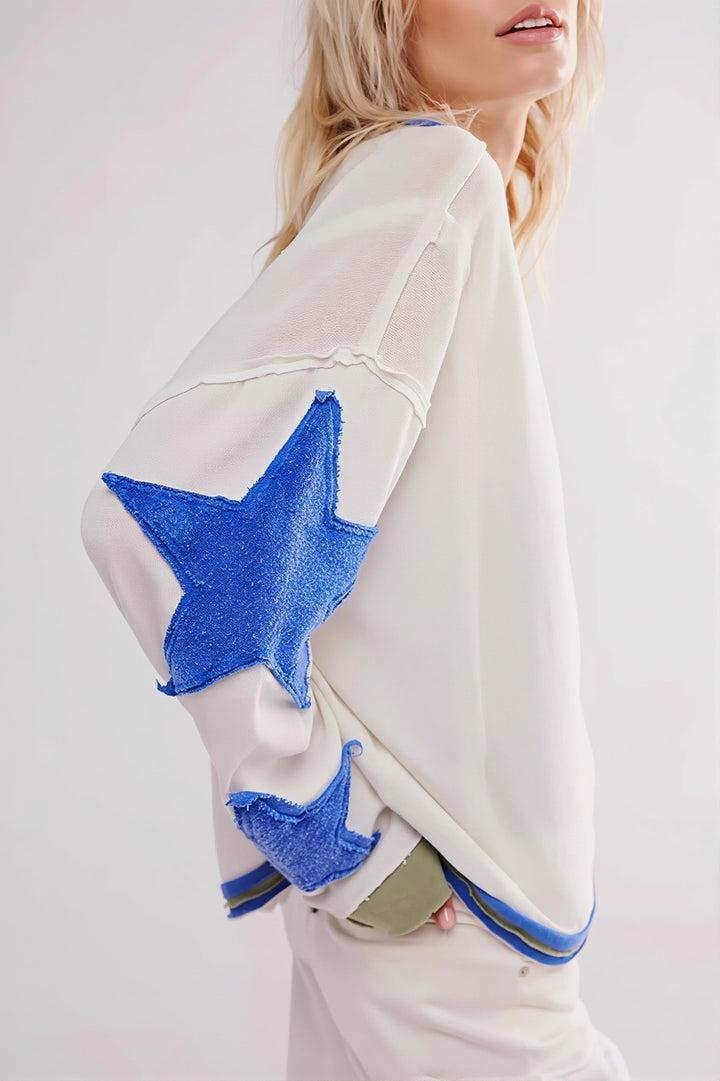 Modna bluza damska oversize z gwiazdą, okrągły dekolt, długi rękaw. Styl streetwear na co dzień.