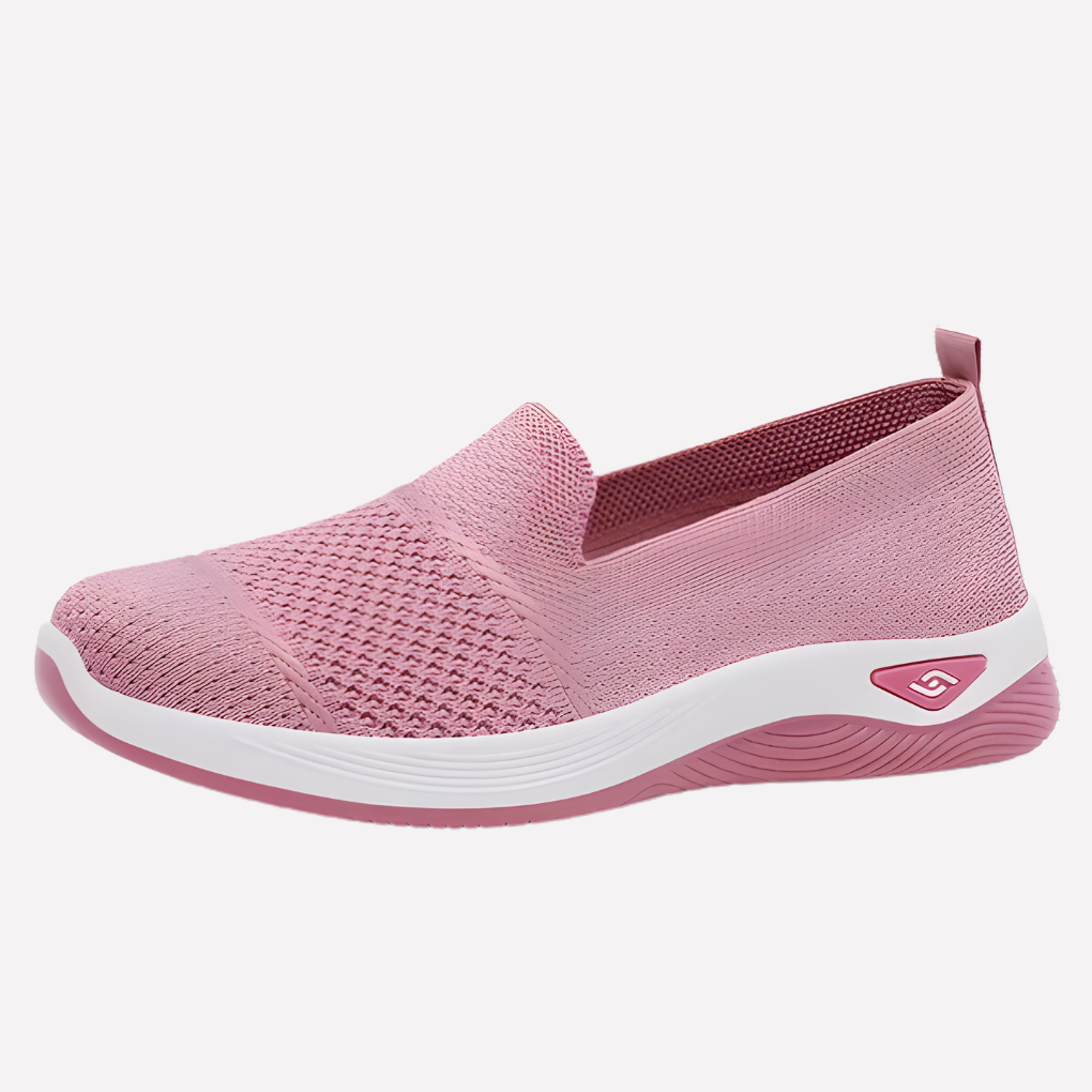 Damskie sportowe trampki widok z tyłu, z subtelnym logo. Wygodne obuwie na co dzień, modne sneakersy casualowe.
