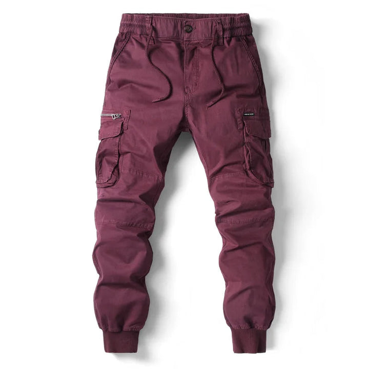 Męskie spodnie utility cargo z praktycznymi kieszeniami bocznymi. Wygodne joggery na co dzień, streetwear.