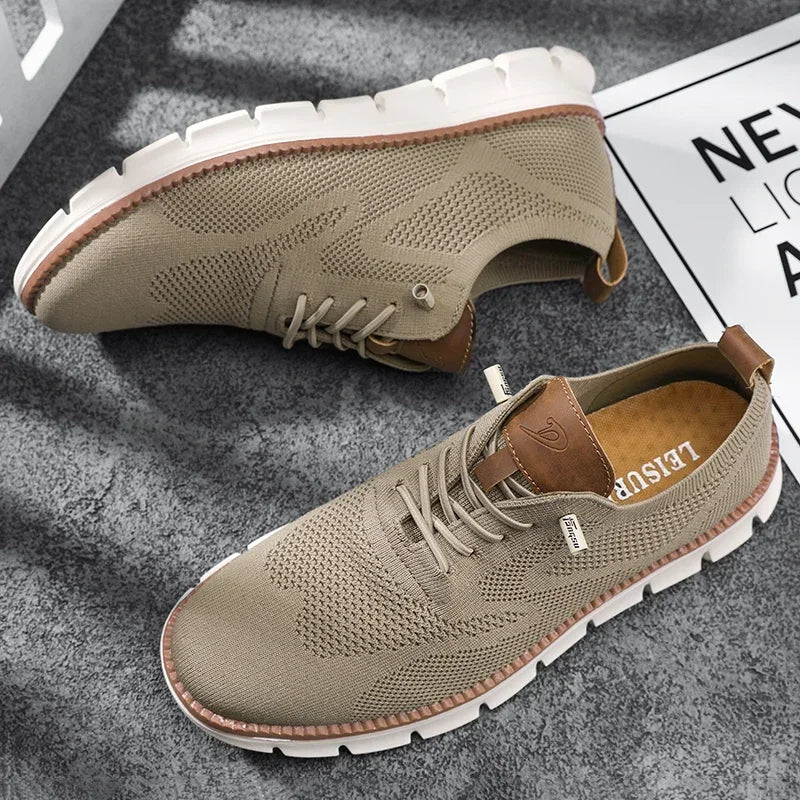 Eleganckie buty męskie w kolorze czarnym, komfortowe i oddychające, idealne do biura. Stylowe obuwie.
