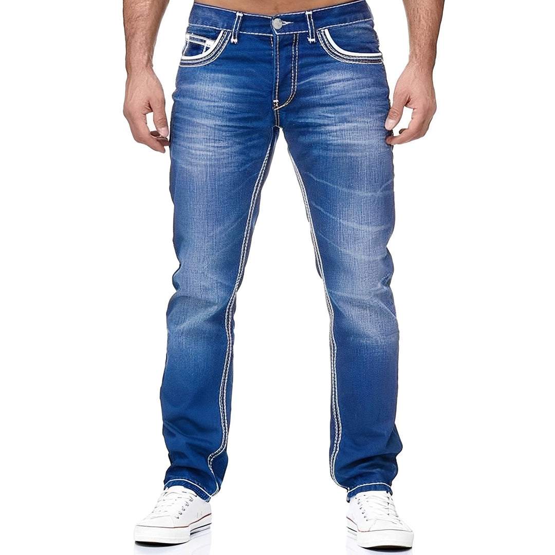Męskie jeansy Andy z efektem postarzenia, idealne do codziennych stylizacji. Wygodne i modne spodnie męskie denim.