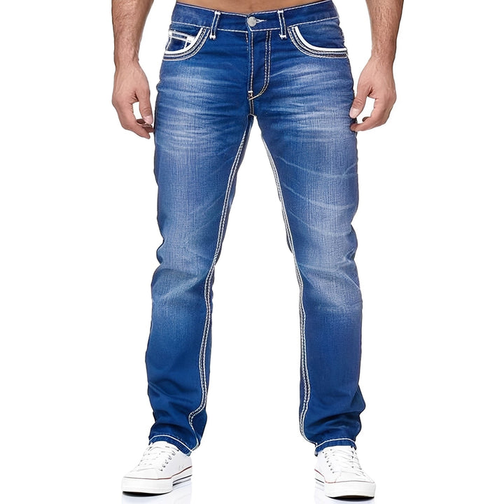 Męskie jeansy Andy z efektem postarzenia, idealne do codziennych stylizacji. Wygodne i modne spodnie męskie denim.