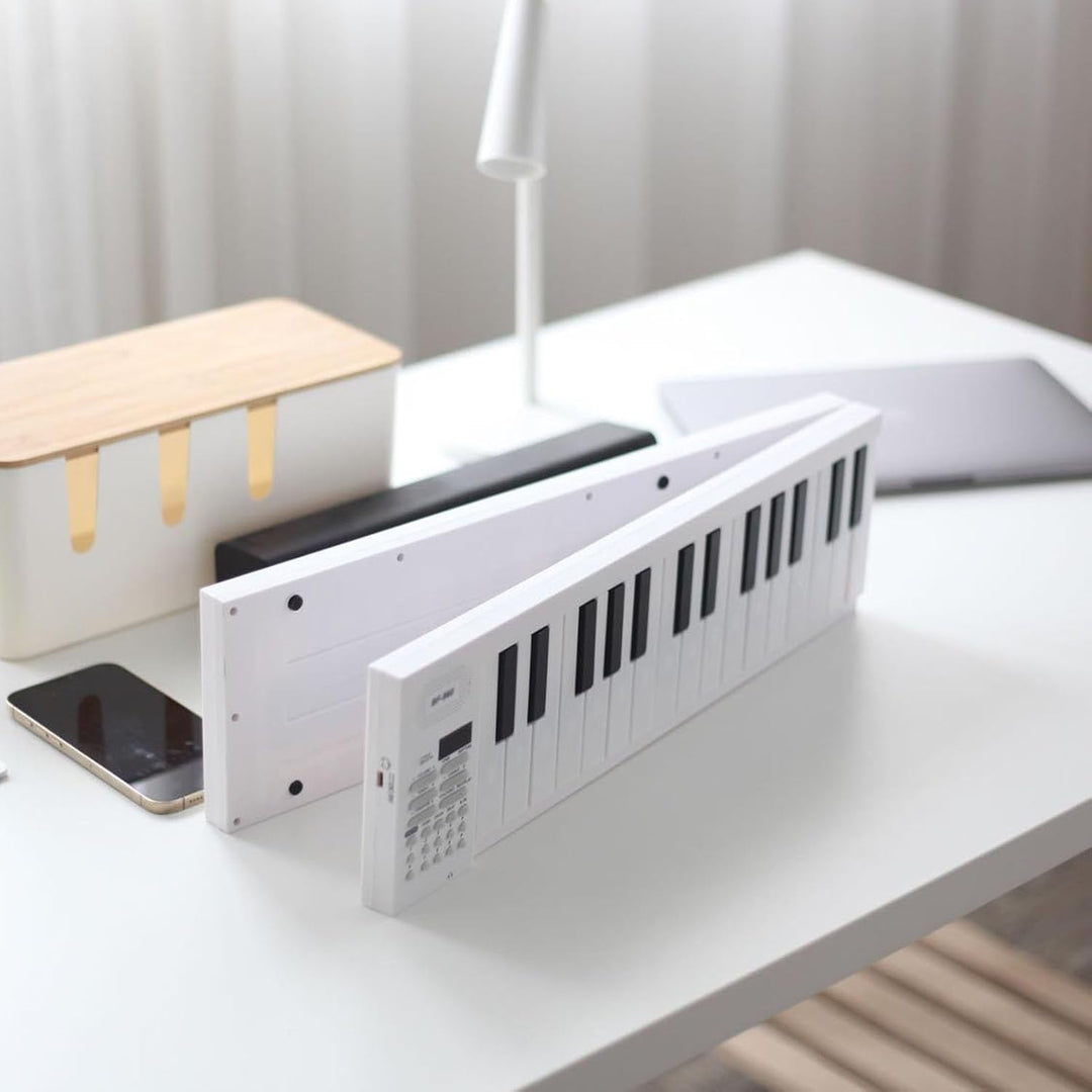 Przenośne pianino cyfrowe składane 61 klawiszy. Lekki instrument do muzyki w podróży.