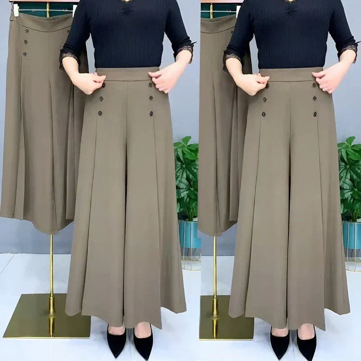 Czarne spodnie damskie wide leg, z elastycznym pasem, eleganckie, na co dzień.
