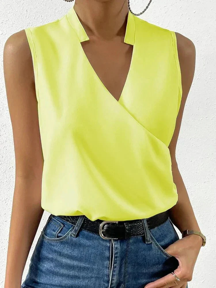Elegancki top damski bez rękawów z dekoltem V, idealny na lato i wiosnę. Stylowa bluzka casual i wizytowa.