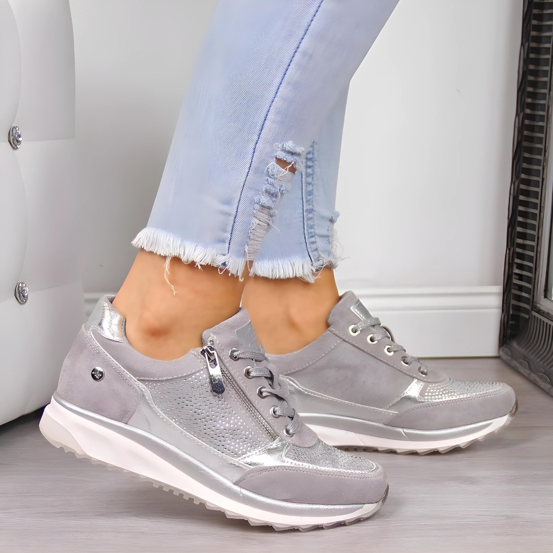 Damskie sneakersy na co dzień z detalami sznurowania. Komfortowe buty sportowe do codziennych aktywności.