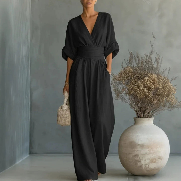 Stylowy kombinezon CJ26 dla kobiet, z dekoltem V, elegancki i wygodny, idealny na każdą okazję.