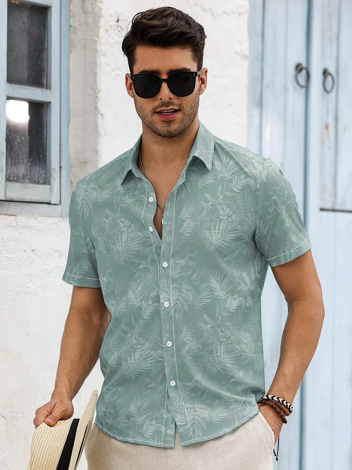 Męska koszula slim fit z krótkim rękawem, tropikalny wzór, jasna zieleń. Idealna na lato i wakacje.